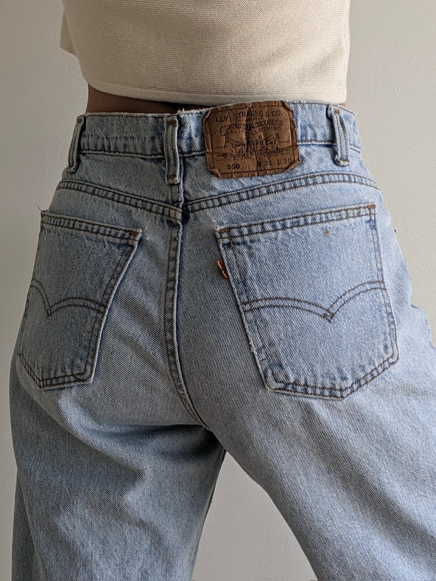 Vintage Levi's 550 Orange Tab Jeans