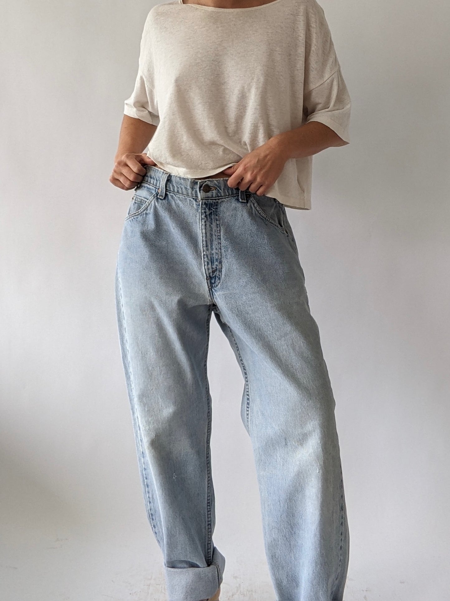 Vintage Levi's Distressed 550 Orange Tab Jeans