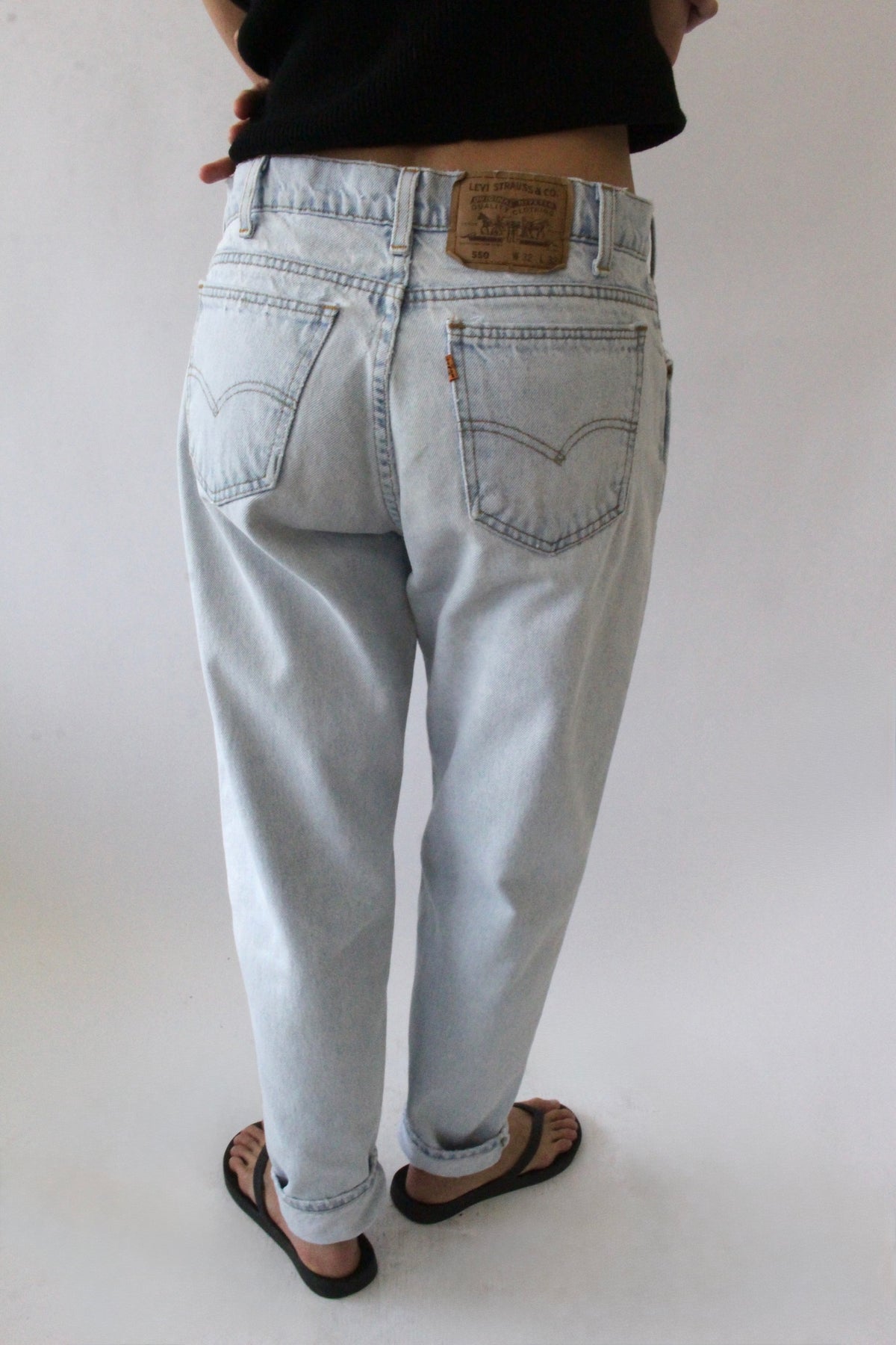 Vintage Levi's 550 Orange Tab Jeans