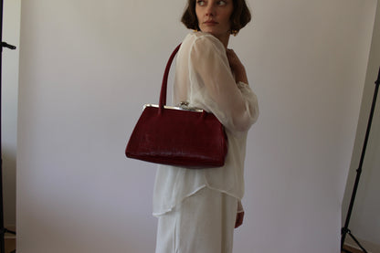 Bold Vintage Red Embossed Leather Bag