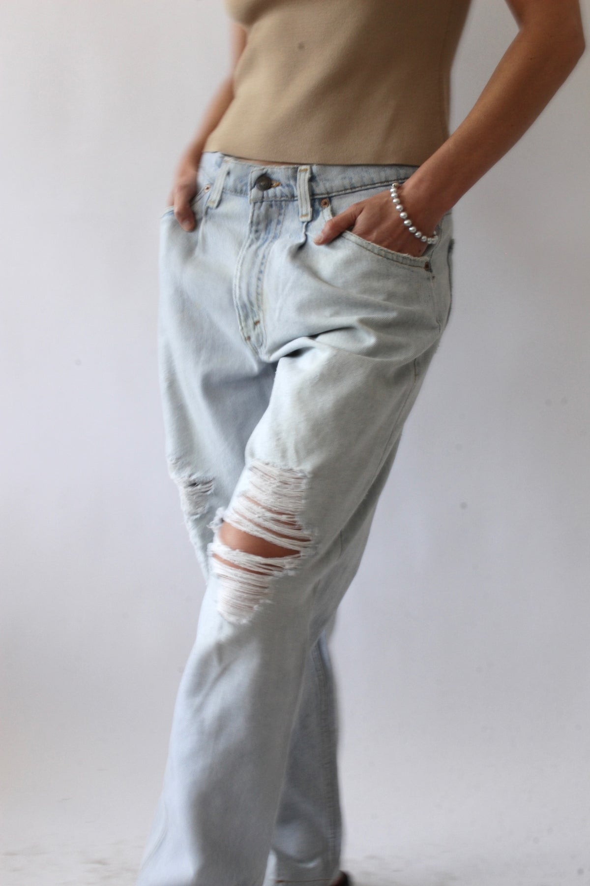 Vintage Distressed Levi's 580 Light Wash Jeans